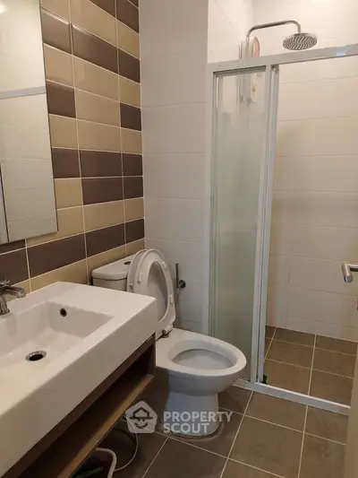 Modern bathroom with sleek shower and stylish tile design