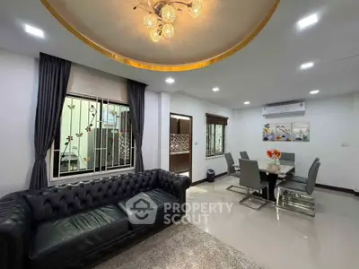 Luxurious living room with elegant decor and modern dining area