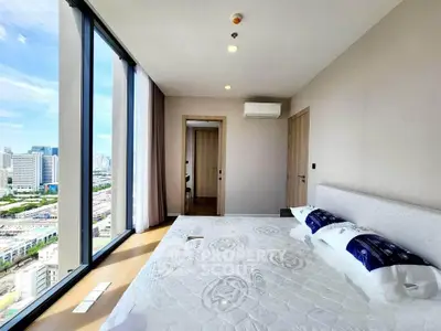 Luxurious bedroom with panoramic city view and modern decor