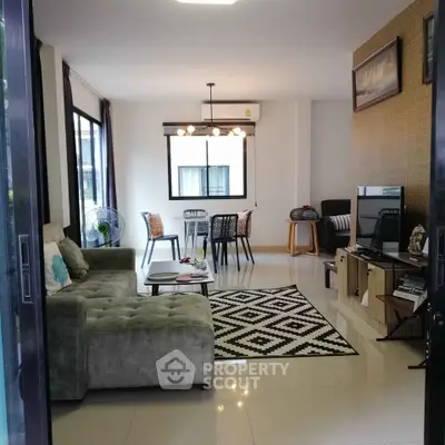 Spacious modern living room with stylish decor and natural light