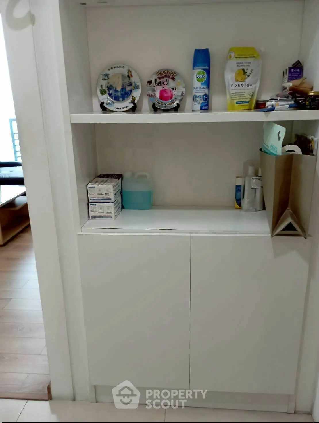 Modern storage cabinet with shelves in a bright interior space