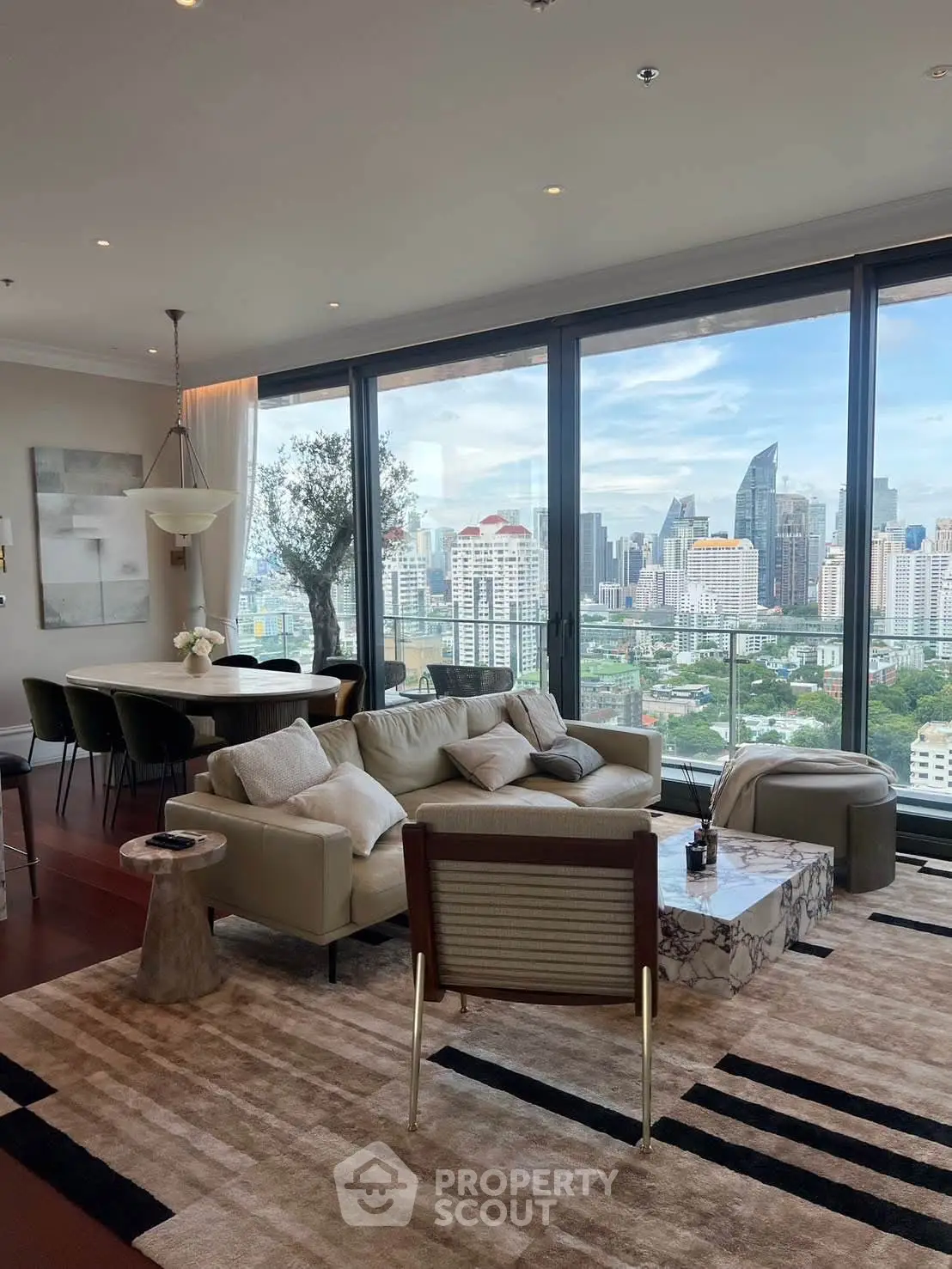 Luxurious living room with stunning city view and elegant decor