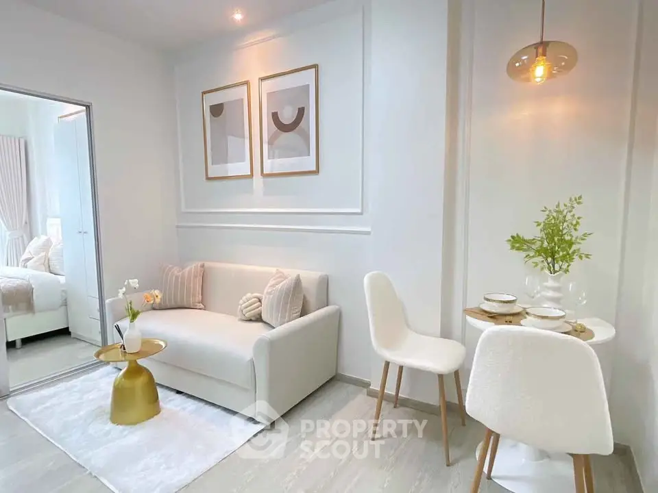 Chic modern living room with cozy sofa and elegant dining area in stylish apartment