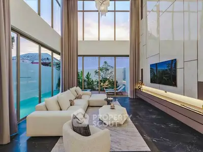 Luxurious modern living room with high ceilings and pool view, featuring elegant decor and spacious seating.