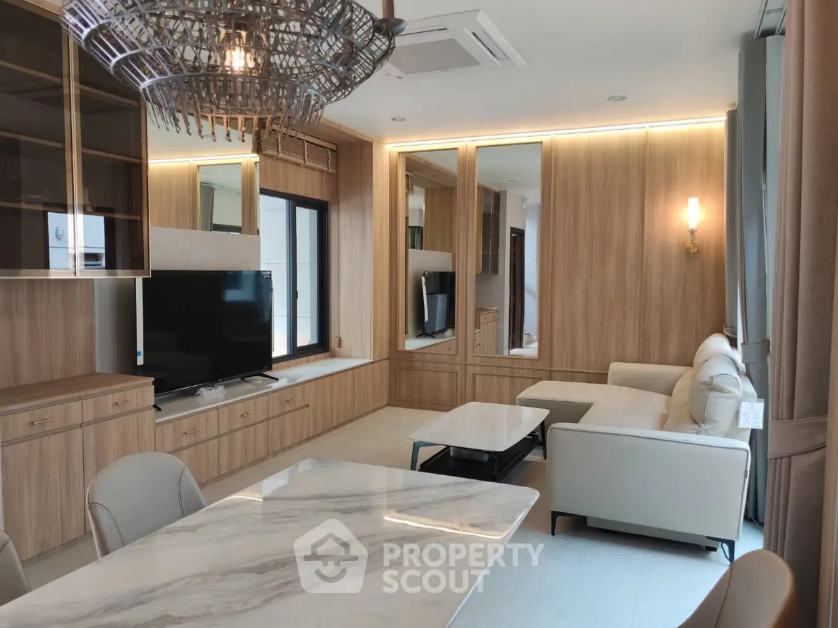 Luxurious modern living room with elegant wooden paneling and stylish furniture