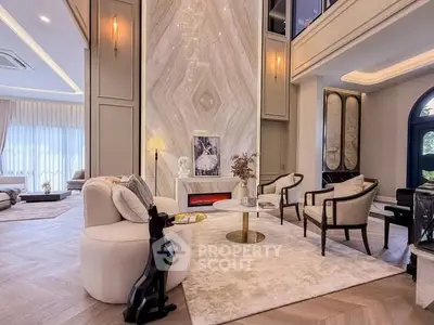 Luxurious modern living room with elegant decor and high ceilings