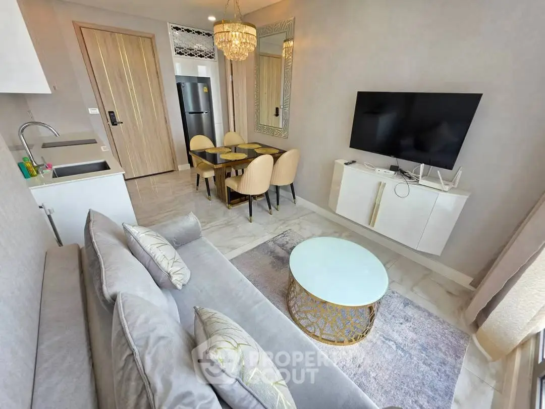 Luxurious modern living room with elegant decor and open kitchen layout