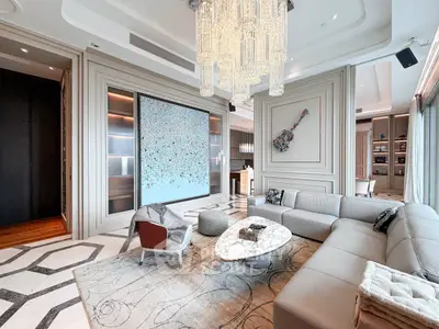 Luxurious living room with elegant chandelier and modern decor