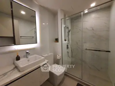 Modern bathroom with sleek design and spacious shower area