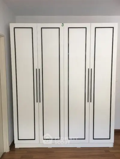 Spacious modern wardrobe with sleek design and ample storage space
