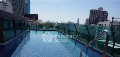 Stunning rooftop pool with panoramic city views, perfect for luxury urban living.