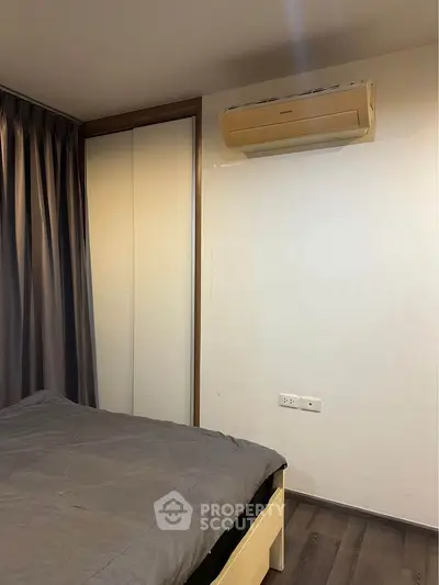 Cozy bedroom with air conditioning and modern decor