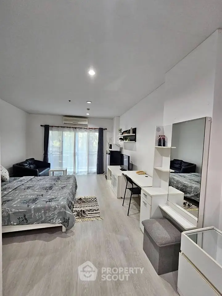 Modern studio apartment with stylish decor and natural light