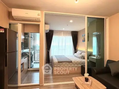 Modern apartment interior with cozy bedroom and open living area, featuring sleek design and natural light.