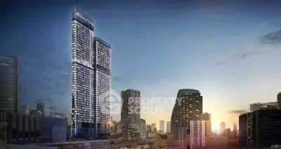 Stunning cityscape view featuring modern high-rise buildings at sunset, showcasing urban luxury living.