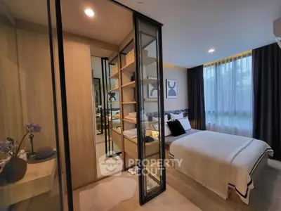Modern bedroom with glass partition and cozy decor