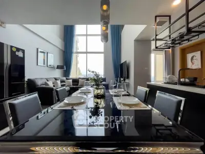 Luxurious modern living room with high ceilings and elegant dining area