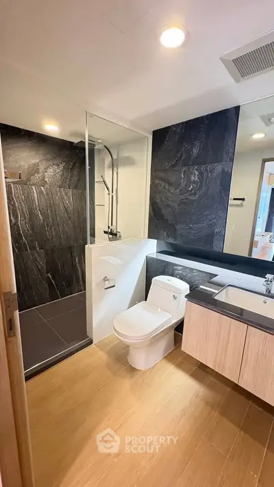 Modern bathroom with sleek design and spacious shower area