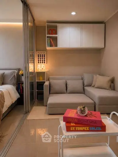 Modern living room with cozy sofa and stylish decor in compact apartment