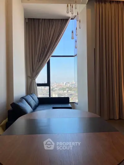 Modern living room with panoramic city view and elegant curtains