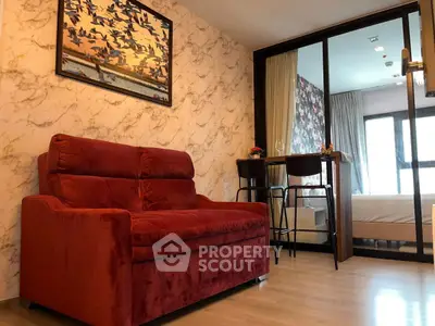 Stylish living room with red sofa and modern decor in a cozy apartment