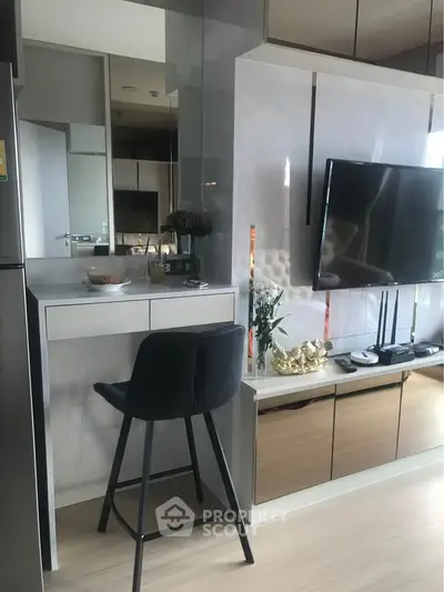 Modern living room with stylish decor and sleek TV setup