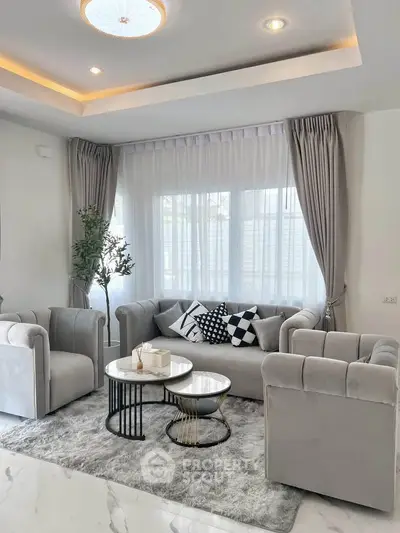 Elegant living room with plush seating and modern decor