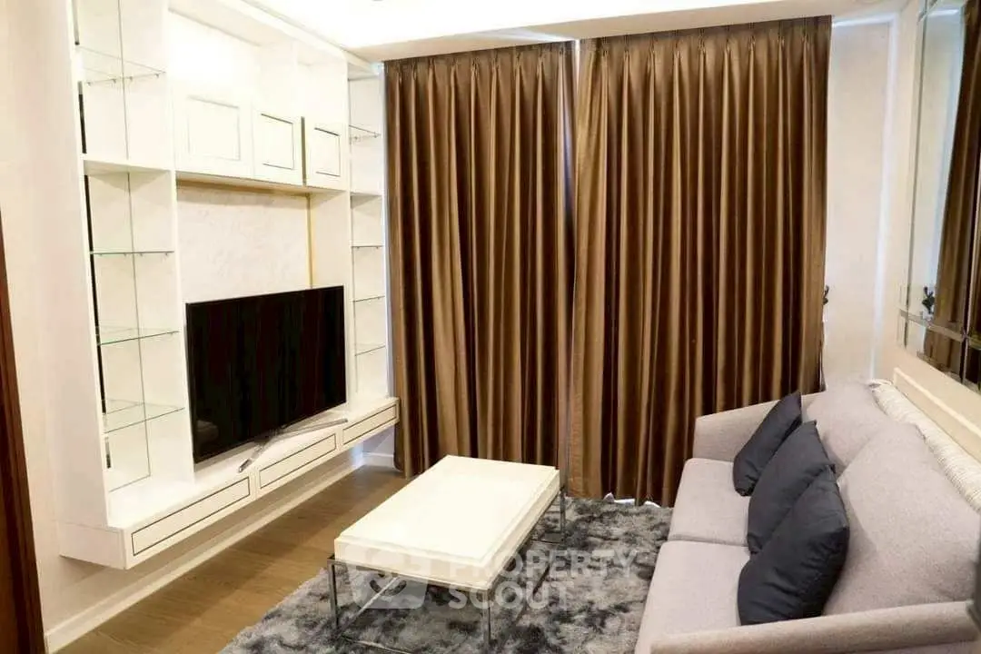 Modern living room with elegant curtains and sleek TV setup