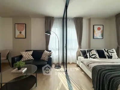 Modern living room with stylish decor and natural light