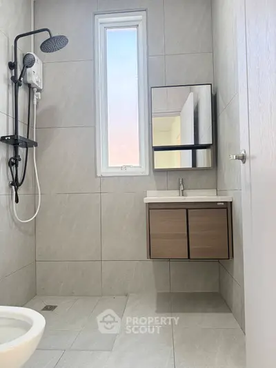 Modern bathroom with sleek fixtures and natural light