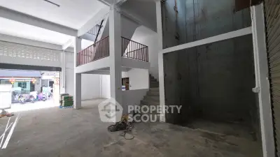 Spacious commercial property with mezzanine and open layout, ideal for retail or office space.