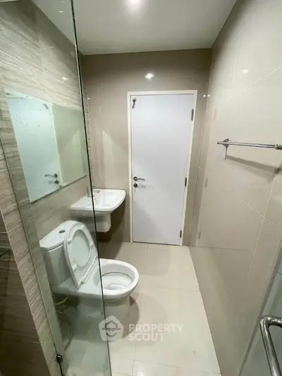 Modern bathroom with sleek design and glass shower enclosure