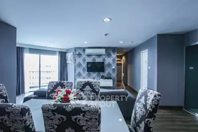 Spacious modern living room with elegant dining area and stylish decor