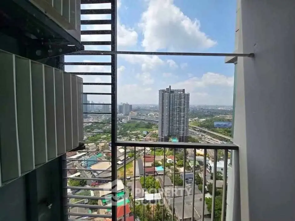 Stunning high-rise balcony view overlooking cityscape and skyline