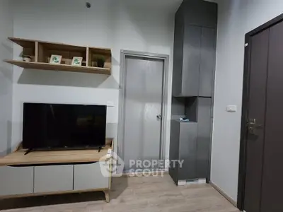 Modern living room with sleek TV stand and minimalist decor