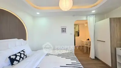 Modern bedroom with stylish decor and cozy ambiance