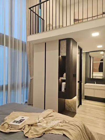 Modern loft bedroom with high ceilings and elegant decor