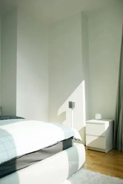 Bright and minimalist bedroom with modern decor and natural light