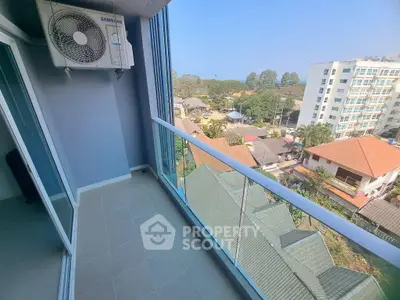 Spacious balcony with stunning city view in modern apartment