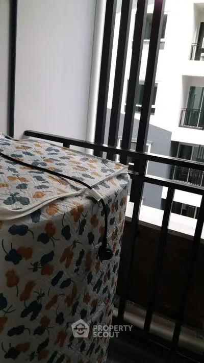 Modern balcony with stylish railing and urban view