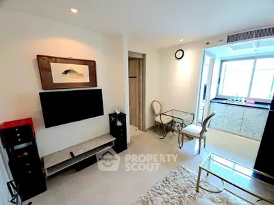 Modern living room with open kitchen and stylish decor