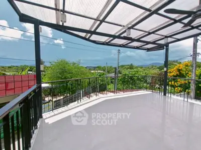 Spacious balcony with stunning views and modern design, perfect for relaxation and entertainment.