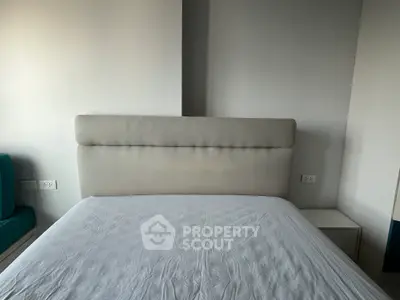 Modern bedroom with minimalist design and neutral tones