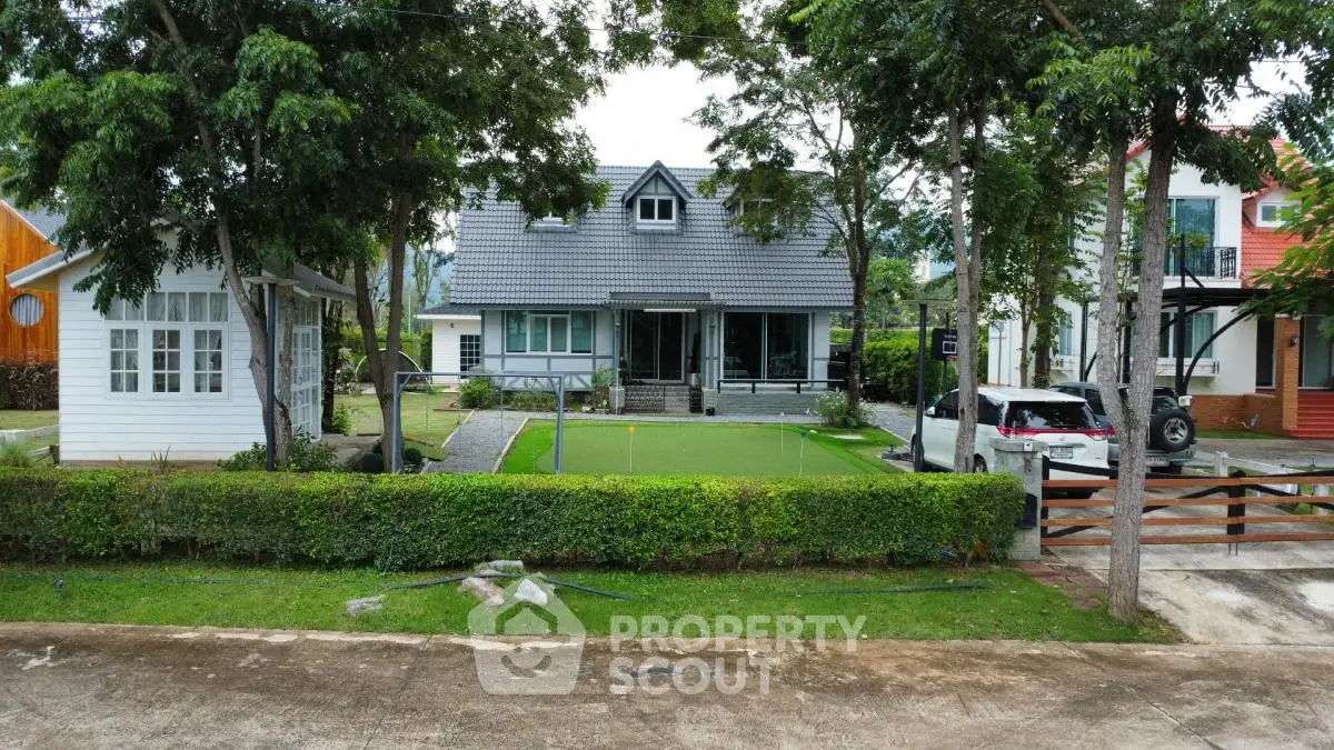 Charming suburban house with lush garden and driveway