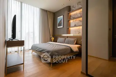 Luxurious modern bedroom with floor-to-ceiling windows and elegant decor.