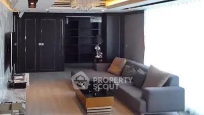 Luxurious modern living room with elegant decor and spacious seating area