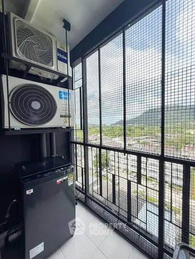 Modern balcony with air conditioning units and scenic view