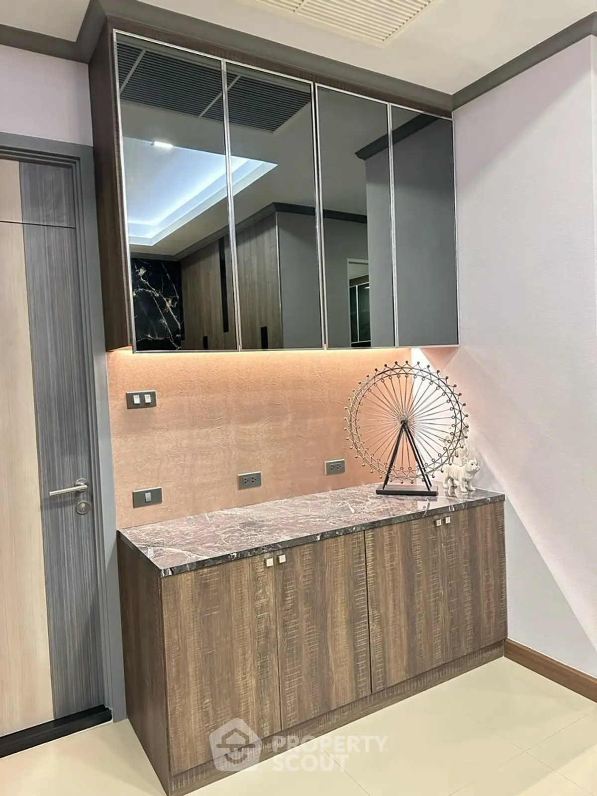 Modern interior with stylish cabinetry and decorative accents