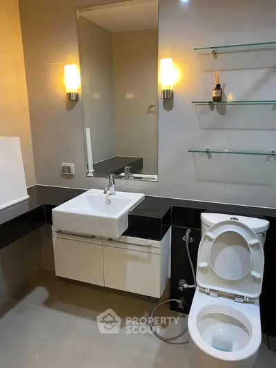 Modern bathroom with sleek fixtures and ambient lighting