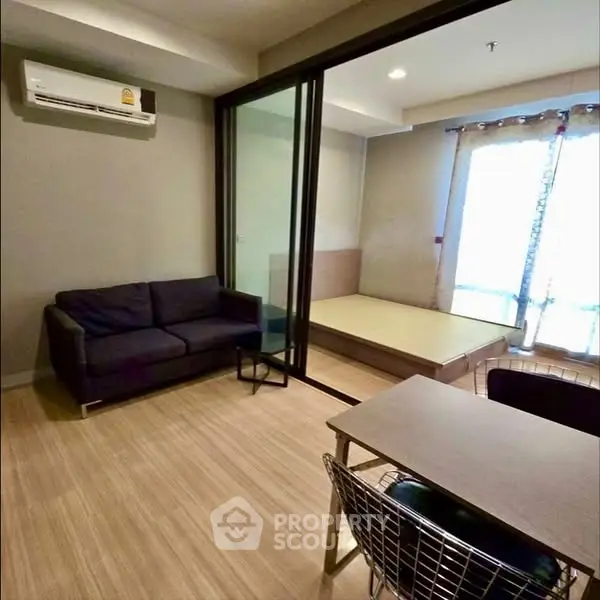 Modern studio apartment with open layout and natural light